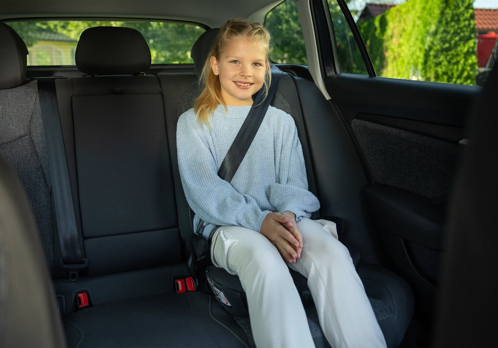 Osann Boot Isofix Sitzerhöhung mit Kind im Auto 