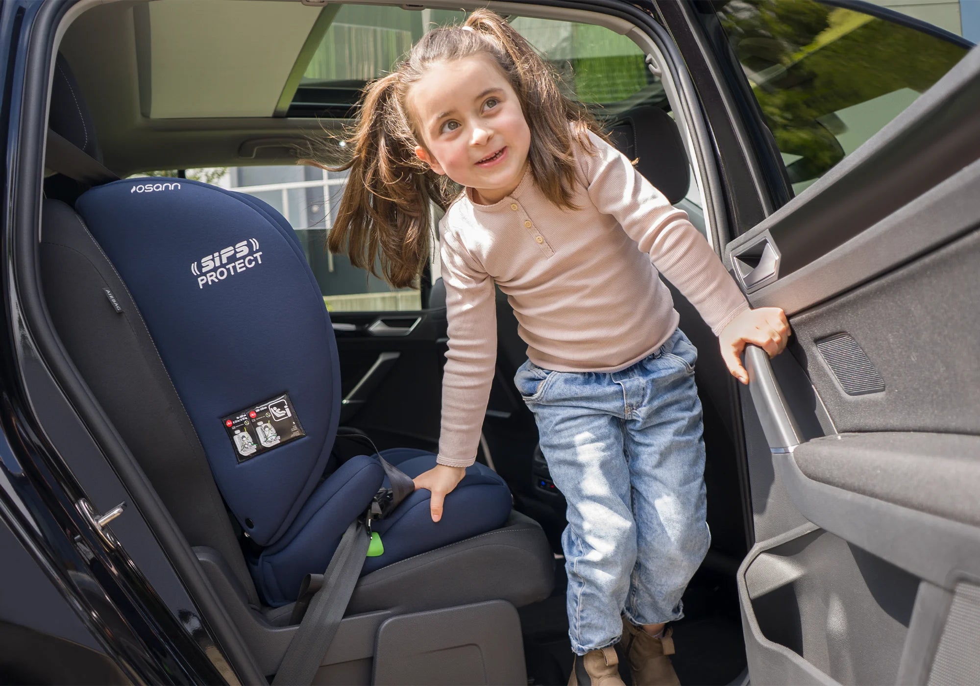 Osann Flux Plus Kindersitz mit Kind im Auto
