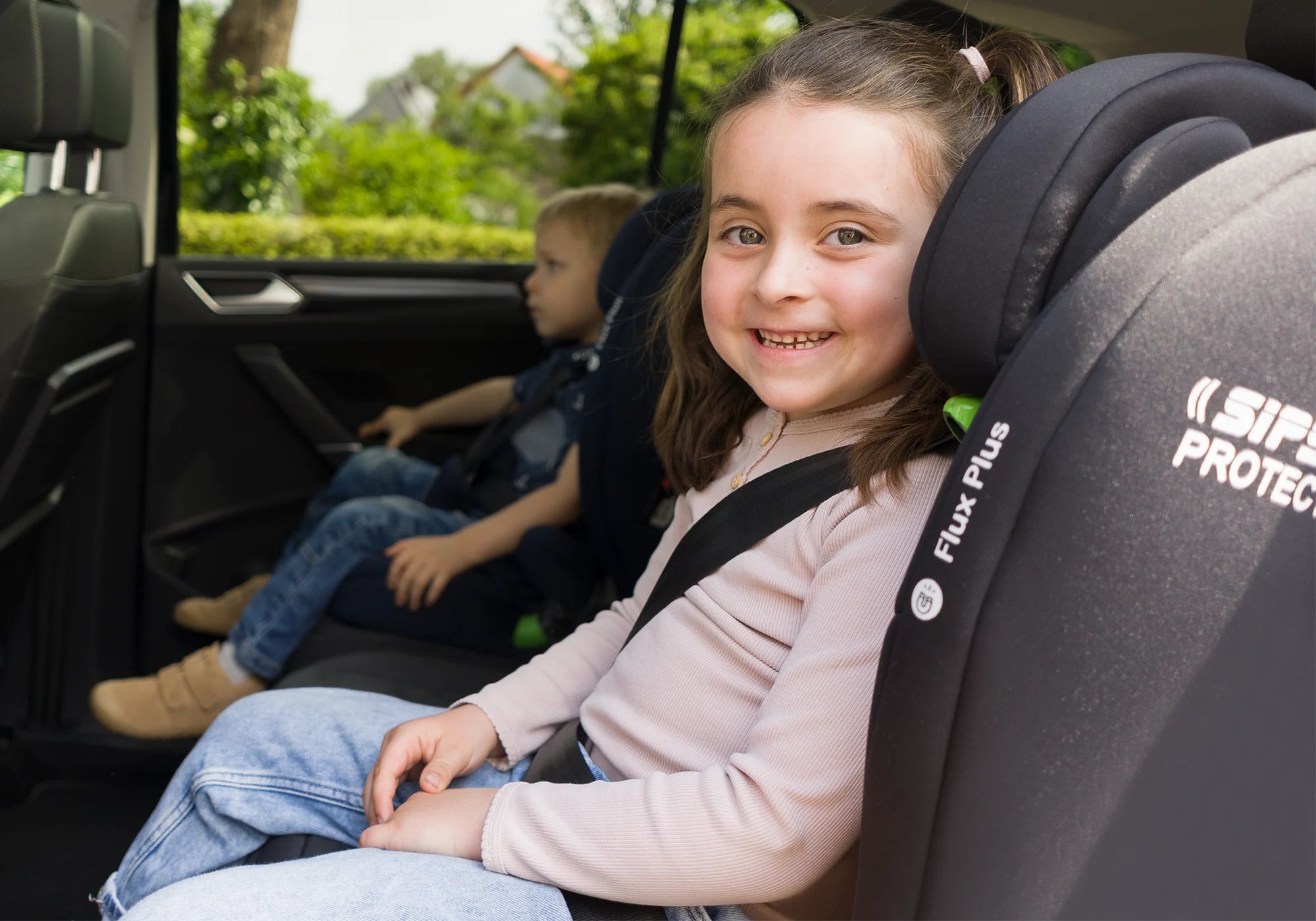 Osann Flux Plus Kindersitz mit Kind im Auto