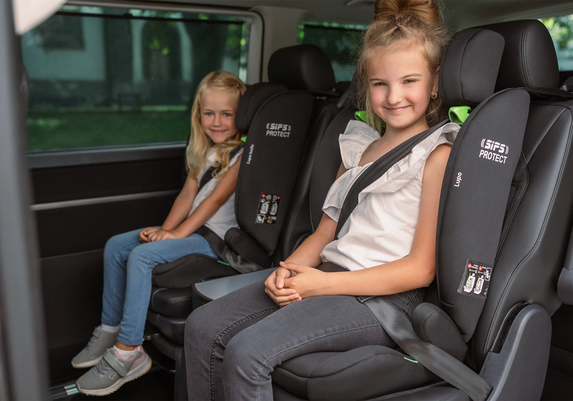 Osann Lupo Kindersitz mit Kindern im Auto