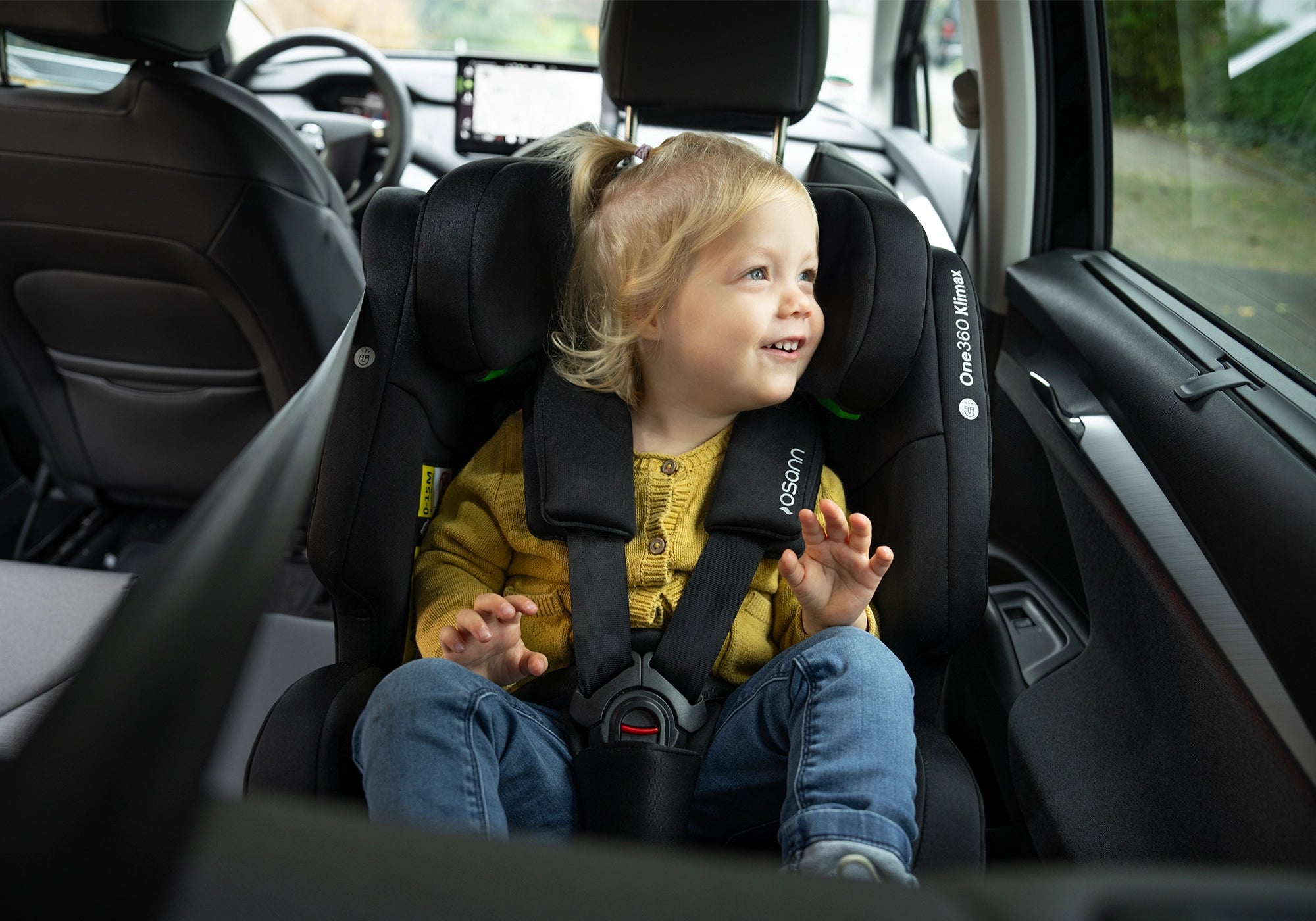 Osann One360 Klimax Kindersitz mit Kind im Auto reboard