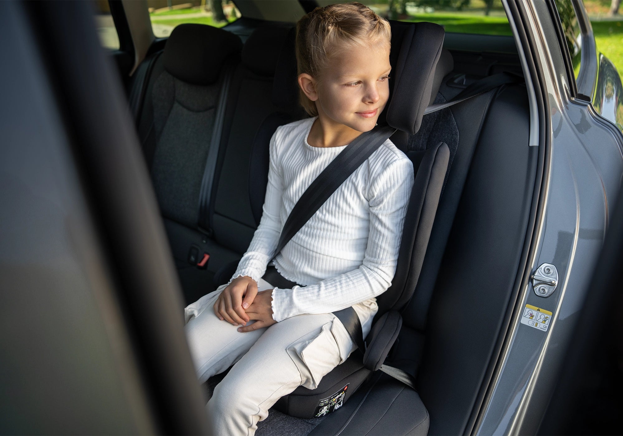 Osann Volpo Kindersitz im Auto mit Kind